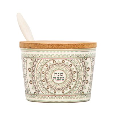 כלי דבש ממותג מבמבוק בעיצוב שנה טובה ורימונים